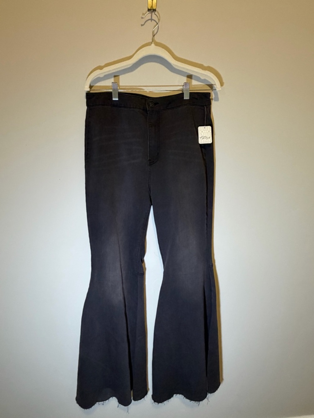 We The Free Black Flared Raw-Hem Jeans